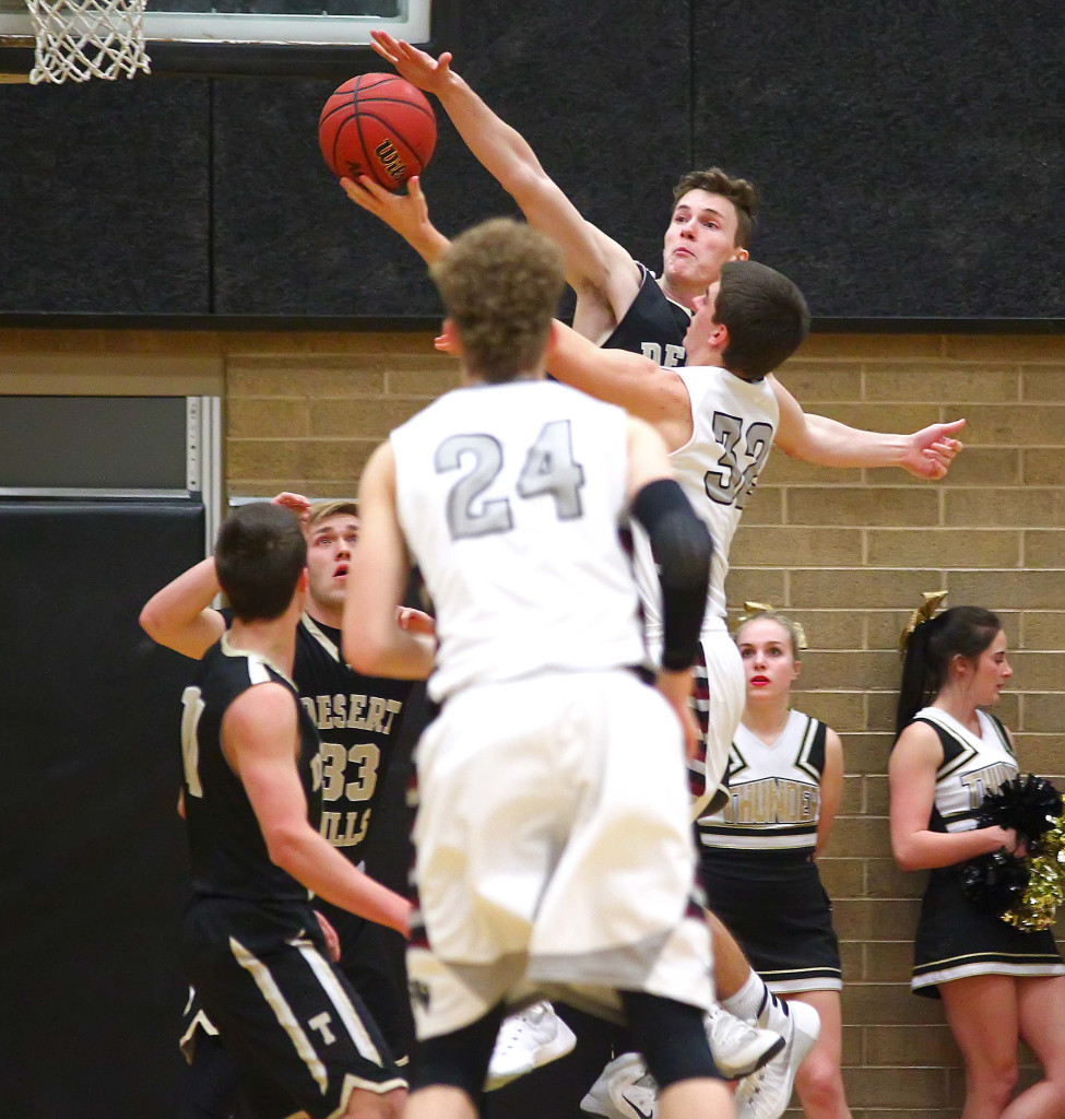 Desert Hills' Cody Fitzgerald (50) blocks the shot of Pine View's Steve Bangerter (32), Pine View vs. Desert Hills, Boys Basketball, St. George, Utah, Feb. 10, 2016, | Photo by Robert Hoppie, ASPpix.com, St. George News