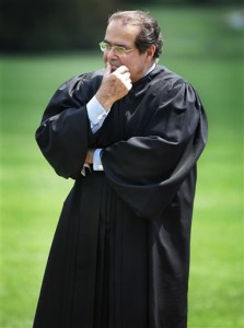 Supreme Court Justice Antonin Scalia listens to President Bush speak during a swearing-in ceremony on the South Lawn at the White House in Washington. On Saturday, Feb. 13, 2016, the U.S. Marshals Service confirmed that Scalia has died at the age of 79. File: Washington, D.C., June 7, 2006 | AP Photo by Ron Edmonds, St. George News