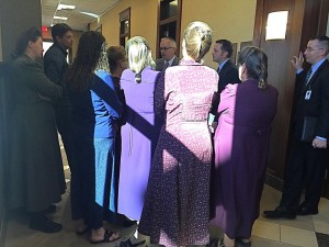 Family and friends of three members of the Fundamentalist Church of Jesus Christ of Latter Day Saints, who appeared in court on conspiracy and money laundering charges, gathered outside the courtroom Wednesday following the initial court hearing, St. George, Utah, Feb. 24, 2016 | Photos by Kimberly Scott, St. George News