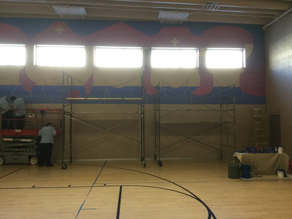 Incarcerated youth at Southwest Utah Youth Center work together to paint a 44-by-24 foot mural, Cedar City, Utah, Date unspecified | Courtesy of the Southwest Utah Youth Center, St. George News 