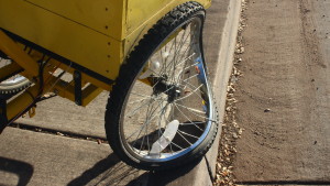 Damaged wheel on a tricycle that was damaged in a collision in St. George on Feb. 26, 2016. | Photo by Don Gilman, St. George News