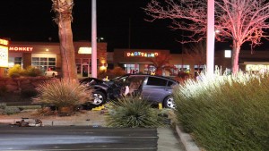 Drivers side of dark gray Nissan Altima after emergency personnel extracted driver from vehicle on W. Sunset Boulevard, St. George, Utah, Feb. 7, 2016| Photo by Cody Blowers, St. George News