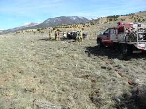 A car catches fire following a rollover authorities said was likely caused by a tire blowout. Cedar City, Utah, Feb. 27, 2016 | Photo courtesy of UHP Trooper Bambi Baie, St. George News / Cedar City News