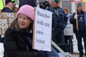 Jennifer Williams, who owns a small ranch outside of Burns, Ore., said she arrived at the demonstrations to send a message that the standoff supporters don’t represent the voice of the community outside the Harney County Courthouse in Burns, Ore., Monday, Feb. 1, 2016. Hundreds gathered to protest and support the armed occupation of a national wildlife preserve, Burns, Oregon, February 1, 2016 | Photo by Molly Young/The Oregonian via AP, St. George NewsT