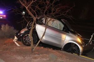 A single vehicle rollover on Red Hills Parkway Tuesday night looked scary, however the driver escaped with bumps and bruises. St. George, Utah, Feb. 23, 2016 | Photo by Ric Wayman, St. George News