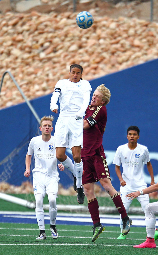 Dixie's Av'ry Green (2) and Cedar's Ethan Fletcher (20), Dixie vs. Cedar, Soccer, St. George, Utah, Mar. 29, 2016, | Photo by Robert Hoppie, ASPpix.com, St. George News