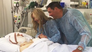 Elder Mason Wells of Sandy, Utah, is greeted in a Belgian hospital by his parents on Thursday, March 24, 2016. Elder Wells was among four Latter-day Saint missionaries injured in an explosion at the Brussels airport on Tuesday, March 22, 2016 | Photo courtesy of LDS Newsroom, St. George News