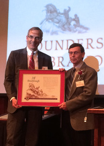 University President Scott L. Wyatt presents Zion National Park Superintendent Jeff Bradybaugh with a distinguished service award for his contributions to the university, Southern Utah University Gilbert Great Hall, Cedar City, Utah, March 23, 2016 | Photo by Carin Miller, St. George News