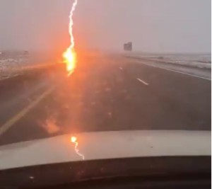 Screenshot of rare video footage that captured a lightning strike on the edge of northbound Interstate 15, Iron County, Utah, March 22, 2016 | Video courtesy of Marquez Jessup, St. George News