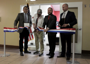 Southern Utah University Student Veterans of America President Gregory Holmes cuts the ribbon, Southern Utah University Veterans Resource and Support Center, Cedar City, Utah, March 22, 2016 | Photo by Carin Miller, St. George News