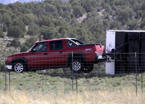 Heavy afternoon winds blew over a trailer being hauled by Chevrolet Avalanche Monday afternoon, Iron County, Utah, March 28, 2016 | Photo by Carin Miller St. George News