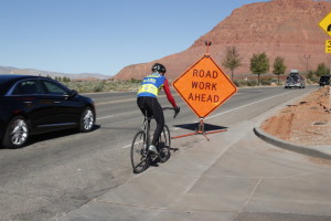 Roads have many hazards for motorists and cyclists alike. When seeking a safe opportunity to pass a cyclist, a motorist must, by law, allow at least three feet. Providing more than three feet when passing, if it is safe to do so, will allow the cyclist to move into the roadway to avoid an upcoming road hazard, Date and location not given | Photo by Tim Tabor, St. George News