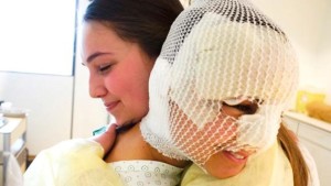 Sister Fanny Rachel Clain, a Mormon missionary who was injured in one of the March 22 bombings in Brussels, gets a visit in the hospital from her former missionary companion, Sister Haylie VanDenBerghe| Photo courtesy of LDS Newsroom, St. George News