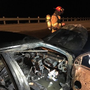 Flames engulfed a vehicle along southbound Interstate 15 milepost 35, Washington County, Utah, March 21, 2016 | Photo by Michael Durrant, St. George News 