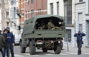 A truck carrying soldiers of the Belgian Army arrives after an explosion in a main metro station in Brussels on Tuesday, March 22, 2016. Explosions rocked the Brussels airport and the subway system Tuesday, killing at least 13 people and injuring many others just days after the main suspect in the November Paris attacks was arrested in the city, police said, Brussels, Belgium, March 22, 2016. | AP Photo/Geert Vanden Wijngaert, St. George News