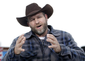 In this file photo, Ammon Bundy speaks during an interview at Malheur National Wildlife Refuge. Dozens of armed occupiers who took over a national wildlife refuge in Oregon have been indicted on additional charges. An indictment unsealed Wednesday, March 9, 2016 reveals new counts against group leader Ammon Bundy and more than two dozen other defendants who were indicted last month on a federal conspiracy charge. Burns, Oregon, Feb. 11, 2016 | Photo by Rick Bowmer, Associated Press, St. George News