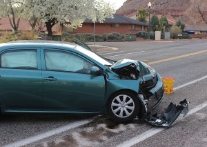 A car missed a curve and hit a pillar in front of a Bloomington home Monday evening. St. George, Utah, March 7, 2016 | Photo by Ric Wayman, St. George News