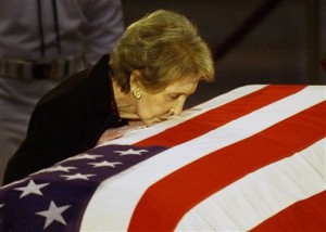 FILE -Former first lady Nancy Reagan kisses the casket of her husband former President Ronald Reagan prior to the removal of his remains from the Capitol Rotunda in Washington. The former first lady has died at 94, The Associated Press confirmed. Simi Valley, California, June 11, 2004 | Photo by Elise Amendola, Associated Press, St. George News