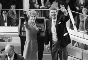 FILE - President Ronald Reagan and first lady Nancy Reagan wave to onlookers at the Capitol building as they stand at the podium in Washington following the presidential swearing in ceremony. The former first lady has died at 94, The Associated Press confirmed. Washington, D.C., Jan. 20, 1981 | Photo courtesy of Associated Press, St. George News