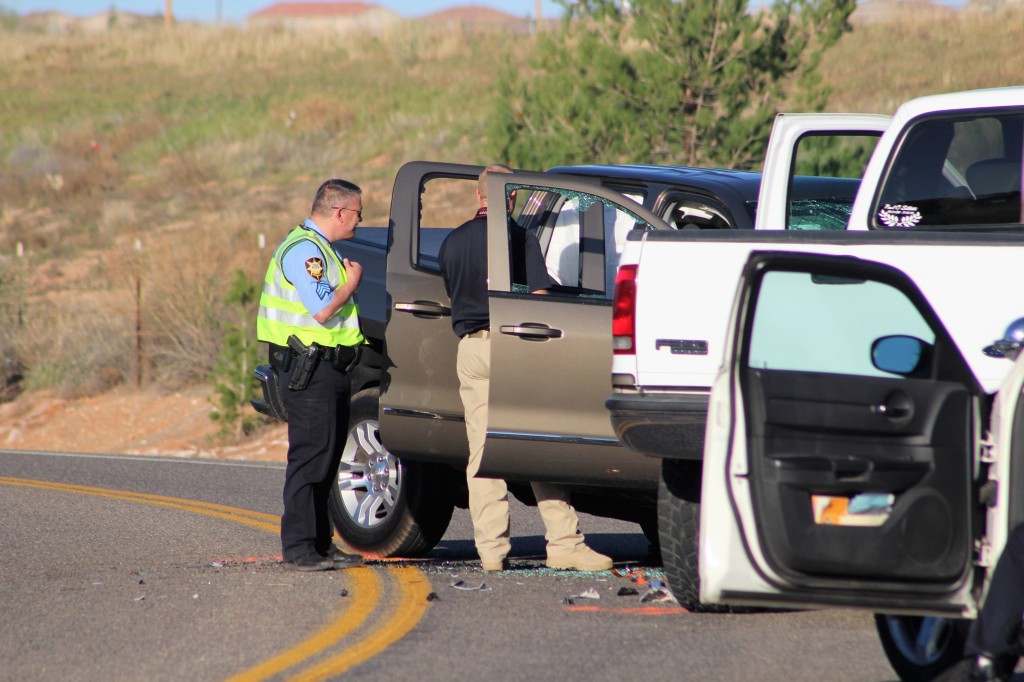 Officers tending to scene after head on collision on Pioneer Road, St. George, Utah, Mar. 24, 2016| Photo by Cody Blowers, St. George News