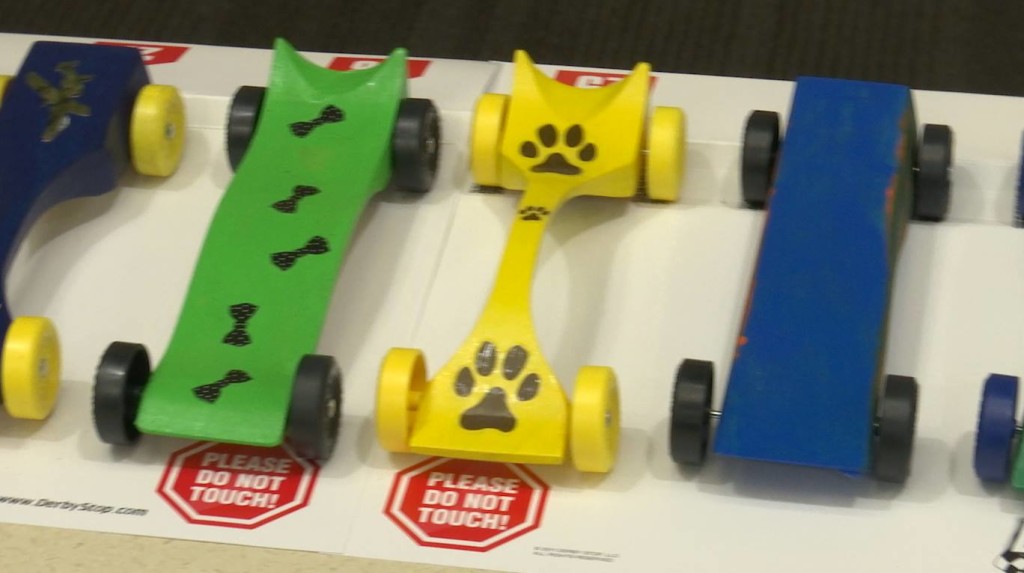 Handcrafted cars donated by Kent Cook and painted by residents and family members entered the Pinewood Derby Extravaganza held at the Southern Utah Veterans Home, Ivins, Utah, April 30, 2016|Photo by Austin Peck, St. George News