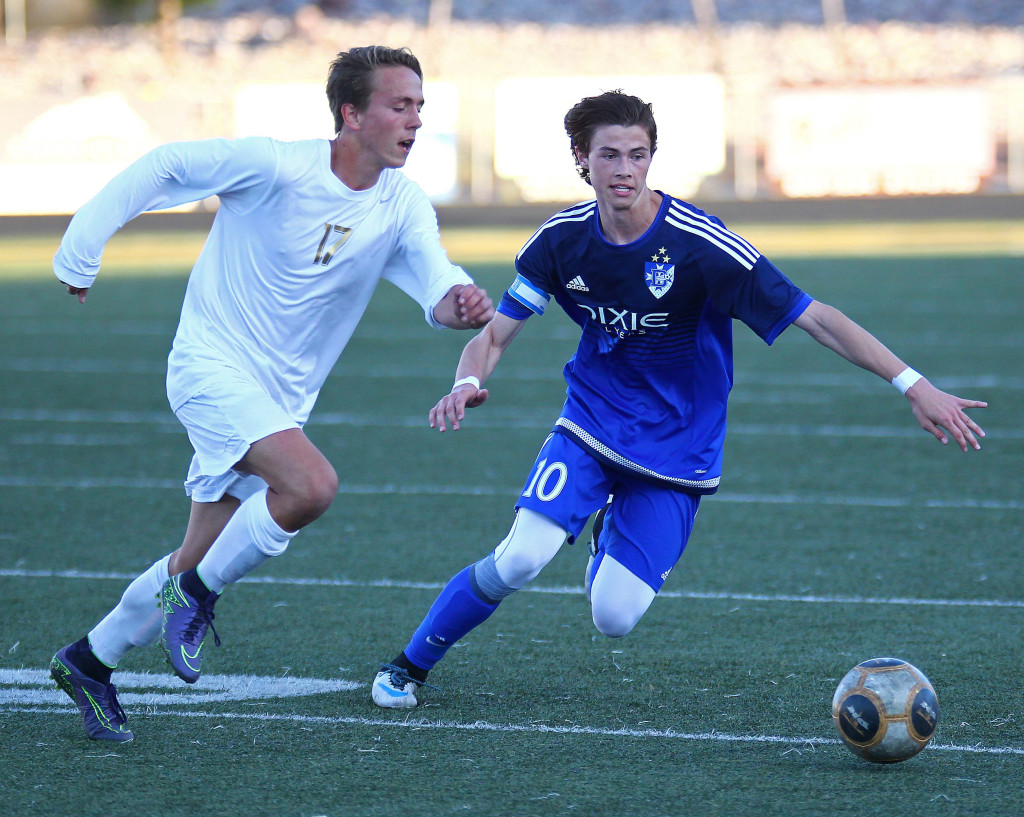 Dixie's Conner Buehner (10) and Desert Hills' Bridger Nelson (17), Desert Hills vs. Dixie, Soccer, St. George, Utah, Apr. 1, 2016, | Photo by Robert Hoppie, ASPpix.com, St. George News