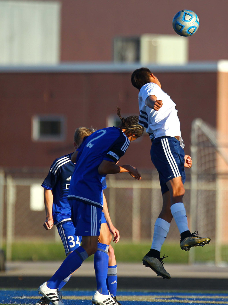 Snow Canyon's Angel Muniz (10) and Dixie’s Av'ry Green (2), Snow Canyon vs. Dixie, Soccer, St. George, Utah, Apr. 12, 2016, | Photo by Robert Hoppie, ASPpix.com, St. George News