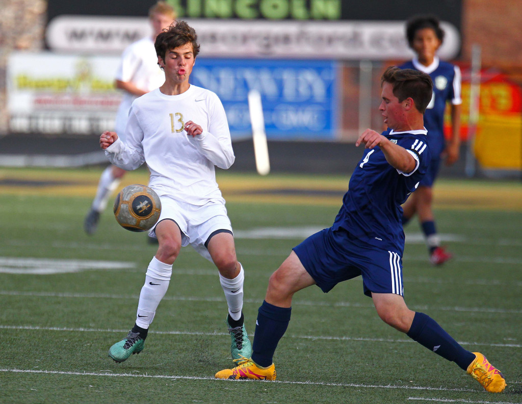 Desert Hills' Rocky Bunker (13) and Snow Canyon's Dallen Moody (4), Desert Hills vs. Snow Canyon, Soccer, St. George, Utah, Apr. 22, 2016, | Photo by Robert Hoppie, ASPpix.com, St. George News