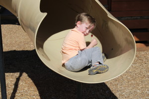 Aiden Hughes, 3, plays on the playground at Park Discovery Friday after it was officially reopened to the public. Cedar City, Utah, April 22, 2016 | Photo by Tracie Sullivan, St. George/Cedar City News