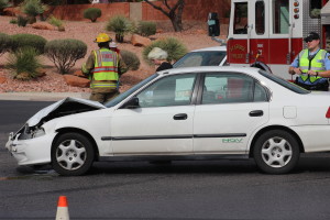 A collision between a Honda Civic and a Pontiac Firebird resulted in both vehicles being towed and a citation issued for the juvenile driver of the Pontiac in St. George, Utah, April 7, 2016 | Photo by Don Gilman, St. George News