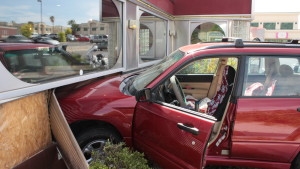 A woman lost control of her Subaru Forester and crashed into the side of Wingers Roadhouse Grill in St. George, Utah, April 21, 2016 | Photo by Don Gilman, St. George News