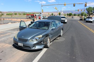 A Lexus ES350 sits at the intersection of Mall Drive and 3000 East after causing an accident Sunday morning, St. George, Utah, April 17, 2016 | Photo by Ric Wayman, St. George News