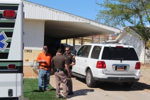 UHP Troopers talk with a homeowner in the Dixie Downs area after an assault on one of the troopers during a traffic stop, St. George, Utah, April 3, 2016 | Photo by Ric Wayman, St. George News