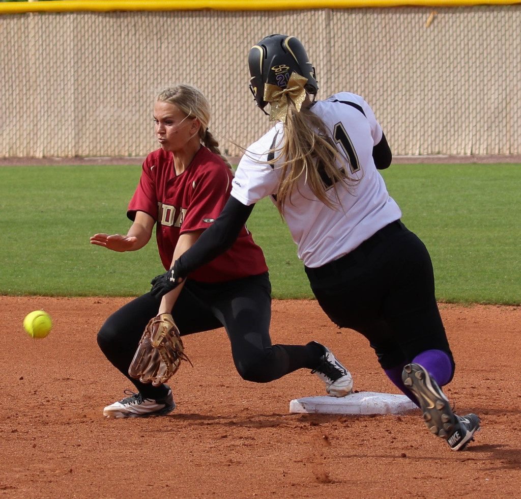 Desert Hills' Megan Wiscombe (21) and Cedar's Allie Meisner (4) Desert Hills vs. Cedar, Softball, St. George, Utah, Apr. 15, 2016, | Photo by Kevin Luthy, St. George News