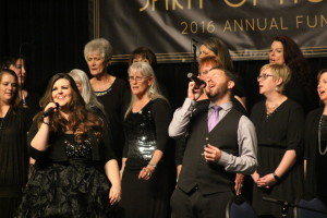 (L-R) Mikalene Ipson and Brobie Perry sing with John Houston's Gospel Choir at the 2016 Spirit of Hope gala fundraiser for the Doctors' Volunteer Clinic, St. George, Utah, April 9, 2016 | Photo by Mori Kessler, St. George News