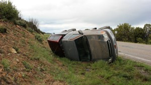 A Toyota Tundra crashed and flipped on its side on SR-18 after hydroplaning near milepost 34, Washington County, Utah, April 29, 2016 | Photo by Mori Kessler, St. George News