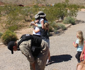 Naomi Turner is enveloped in a bear hug from her daughter, granddaughter and her other granddaughter is running toward her as well, after being missing for 16 hours on the Arizona Strip. Mohave County, Arizona, April 2, 2016 | Photo by Ric Wayman, St. George News