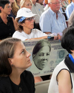 FILE - In this Associated Press file photo, a woman holds a sign supporting Harriet Tubman for the $20 bill during a town hall meeting at the Women's Rights National Historical Park in Seneca Falls, N.Y. A Treasury official said Wednesday that Secretary Jacob Lew has decided to put Harriet Tubman on the $20 bill, making her the first woman on U.S. paper currency in 100 years. Seneca Falls, New York, Aug. 31, 2015 | Photo by Carolyn Thompson, Associated Press, St. George News