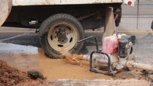 City of St. George water crews work to repair a water main break on the 50 East block of 700 South that flooded a nearby townhome, St. George, Utah, May 20, 2016 | Photo by Mike Cole, St. George News