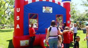 A bounce house kept children entertained during the Utah Foster Care March for Kids event in St. George, Utah, May 27, 2016 | Photo by Don Gilman, St. George News