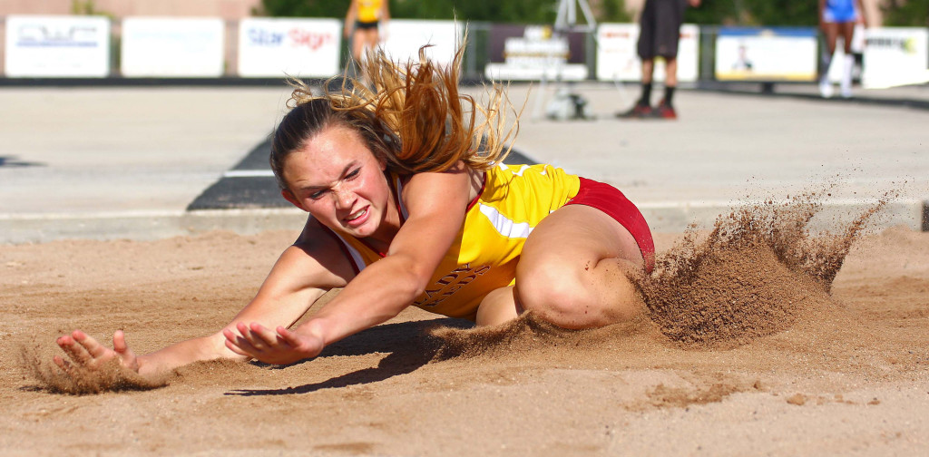 Cedar's Morgan Myers competes in the long jump, Region 9 Track and Field Championships, May 12, 2016, | Photo by Robert Hoppie, ASPpix.com, St. George News