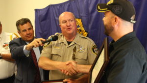 Washington County Sheriff Cory Pulsipher congratulates Joe Hamblin during an award ceremony at the American Legion Post 90 in St. George, Utah, May 25, 2016 | Photo by Don Gilman, St. George News