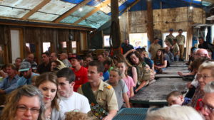 Friends and family members look on at a ceremony honoring five young men who had achieved the rank of Eagle Scout, Leeds, Utah, May 28, 2016 | Photo by Don Gilman, St. George News