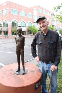 Franz Johansen with his contribution to Art Around the Corner, Main Street, Downtown St. George, Date not given | Photo Courtesy of Art Around the Corner, St. George News