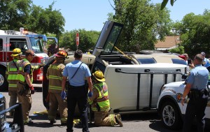 Failure to stop at a stop sign caused a Toyota FJ Cruiser to roll on its side Monday afternoon, St. George, Utah, May 9, 2016 | Photo by Ric Wayman, St. George News