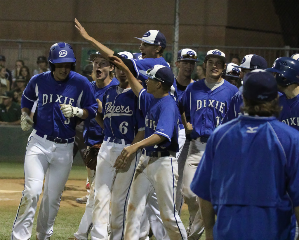 Dixie's Chance Vowell (3), is congratulated by his teammates after hitting a home run Snow Canyon vs. Dixie, Baseball, St. George, Utah, May 5, 2016, | Photo by Kevin Luthy, St. George News