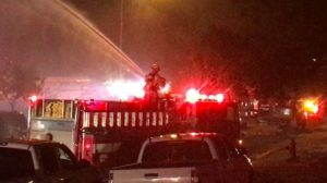 The St. George Fire Department was called back to the scene of an early-morning fire that consumed a Frito-Lay warehouse when high-winds kicked up a small spot fire on the property, St. George, Utah, May 30, 2016 | Photo by Mike Cole, St. George News