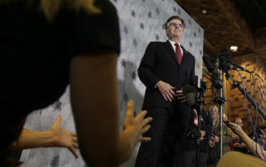 Texas Lt. Gov. Dan Patrick, right, listens to a reporter's question during a news conference at the Texas Republican Convention. Texas is signaling the state will challenge an Obama administrative directive over bathroom access for transgender students in public schools. Dallas, Texas, May 13, 2016 Photo by LM Otero (AP), St. George News