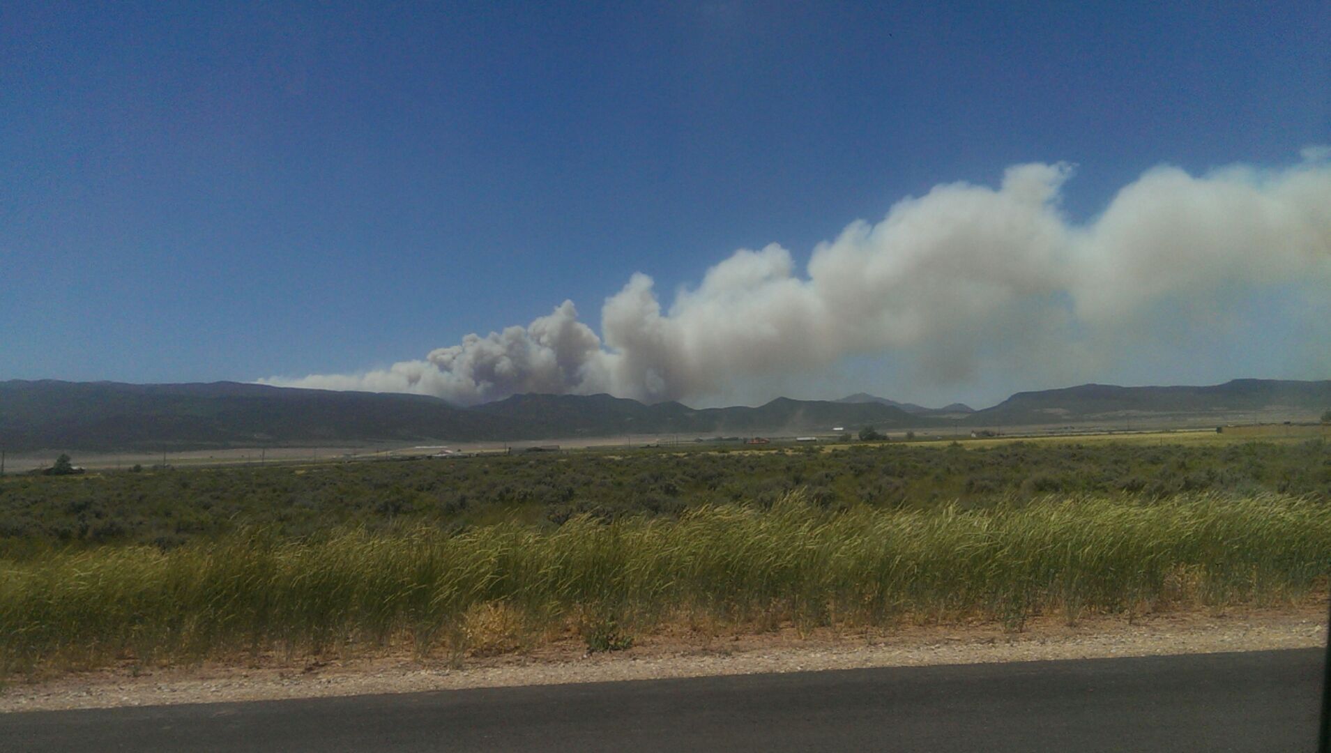 Smoke from the Aspen Fire burning about 15 miles southwest of Cedar City can be seen rising overhead Wednesday, Cedar City, Utah, June 15, 2016 | Photo courtesy Jesse Applegate, St. George News