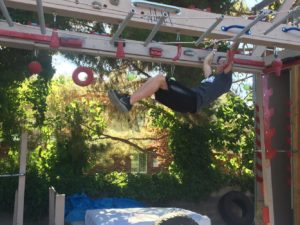 Brian Beckstrand tackles an obstacle on his backyard course, St. George, Utah, June 2, 2016 | Photo by Hollie Reina, St. George News